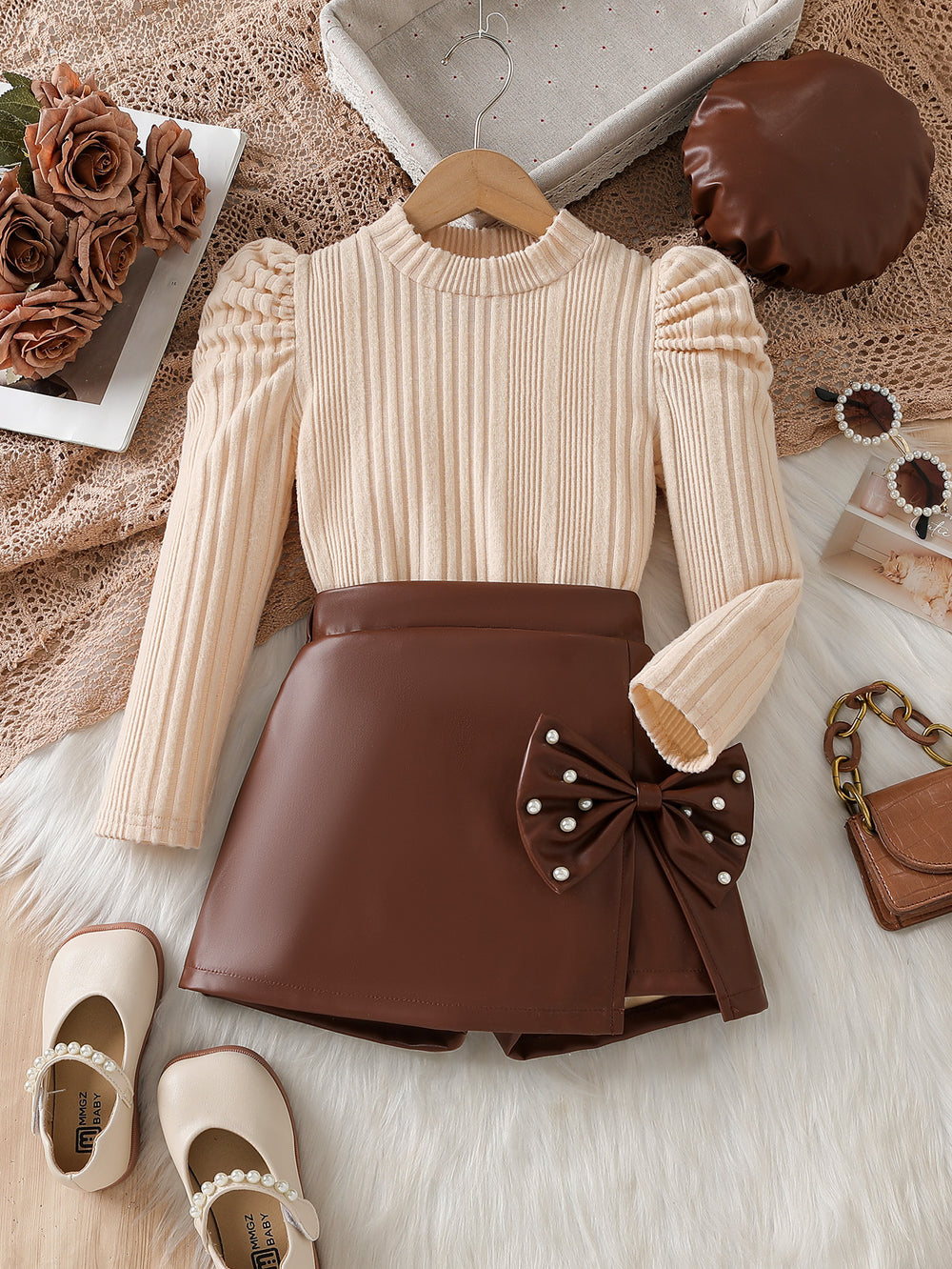 autumn new arrival: round neck princess sleeve textured top + asymmetrical bow leather skirt two-piece set
