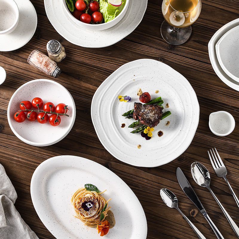 Minimalist blue and white polka dot ceramic bowls, plates, and dishes - perfect for home, restaurant, western cuisine, steak, high-end hotel, and unique dessert presentation