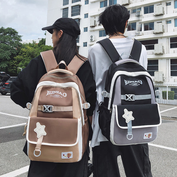 Winter new contrasting color backpack large capacity lightweight fashion burden reduction versatile school bag design sense student backpack