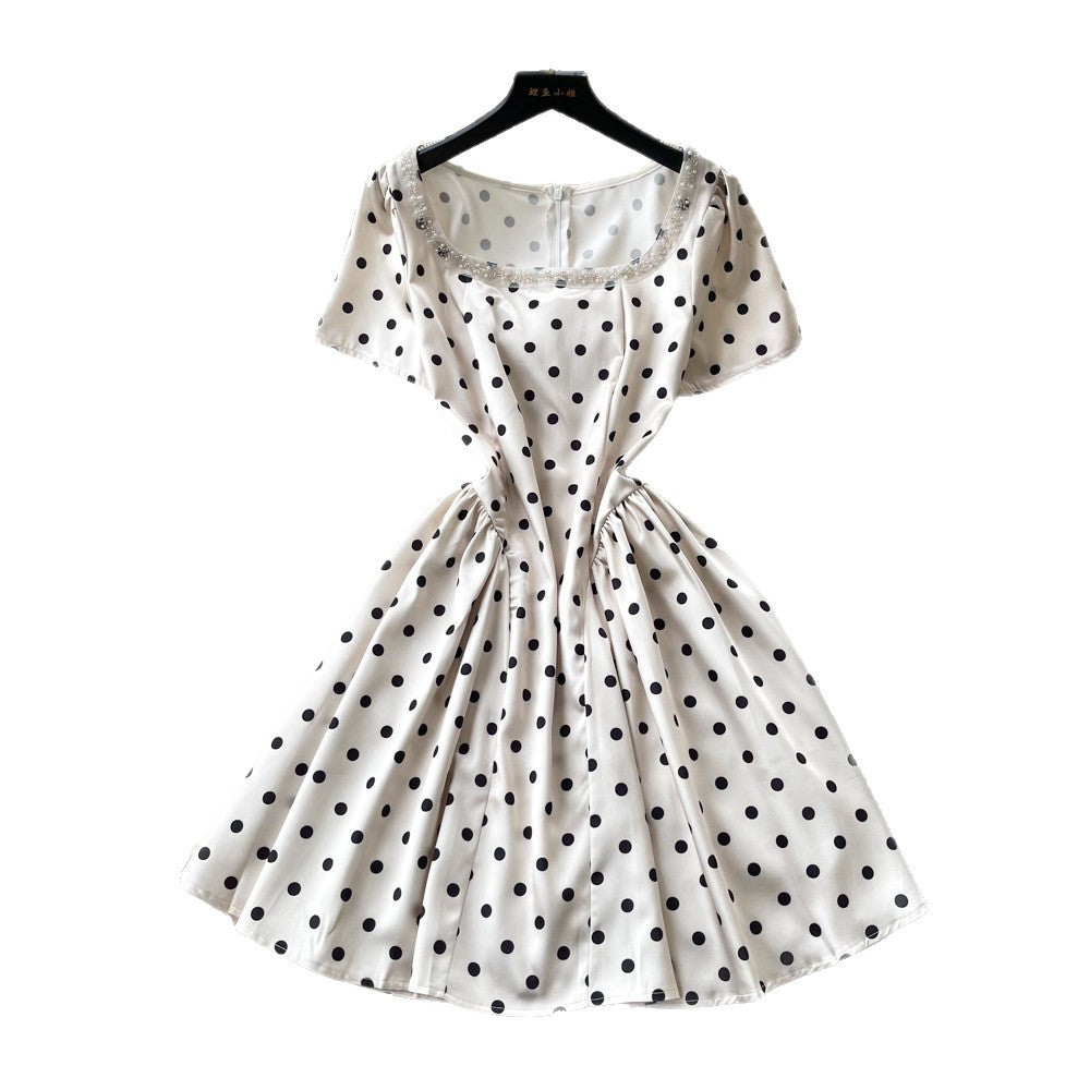 French chic polka dot dress - effortless summer style: square neck, cinched waist, slimming a-line for petite figures