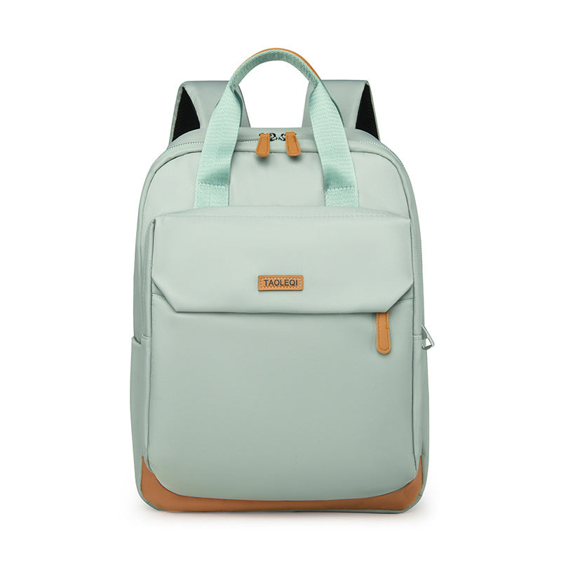 New large-capacity simple travel backpack, lightweight and trendy college student schoolbag, fashionable business commuter backpack.