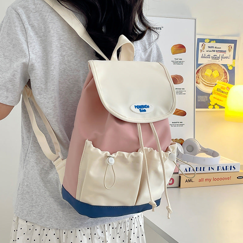 Summer new splicing contrasting color backpack 2025 bag cover design Mori niche leisure backpack going out travel bag