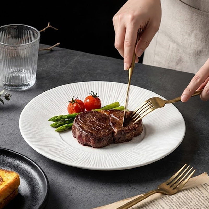 Nordic minimalist black and white ceramic steak plate - western dinner plate for restaurant, home, and hotel use - flat plate with unique creative presentation