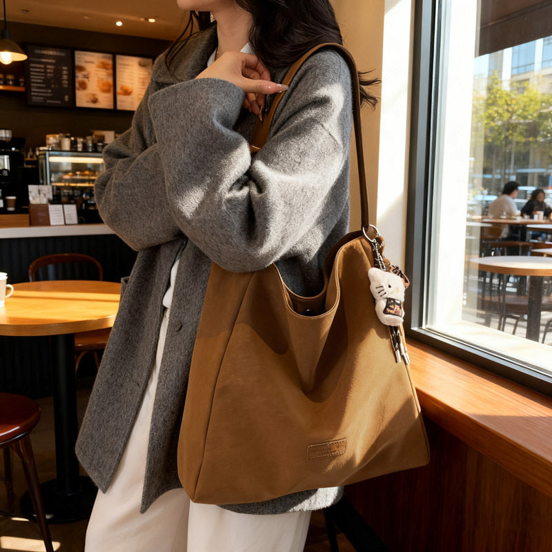 Large capacity retro handbag for women, trendy 2025 new arrival, minimalist versatile soft shoulder bag, high-end commuter tote bag