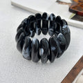 Bracelet women's wholesale european and american cross-border special-shaped splicing elastic resin bracelet niche high-end sense of smudged exaggerated hand jewelry
