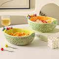 High-style cantaloupe ceramic fruit platter and fork set, perfect for home use. includes fruit picks, dessert forks, and a storage bowl, ideal for the living room coffee table