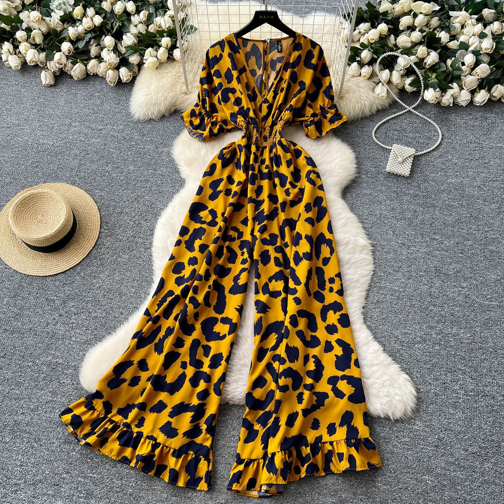 Summer vacation chic: effortless & mature casual v-neck short sleeve jumpsuit with elastic waist, high waist, slimming wide leg, and printed design