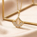 Popular internet celebrity smart cat's eye stone ginkgo leaf diamond necklace accessible luxury niche women's fashion titanium steel clavicle chain jewelry
