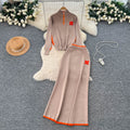 Minimalist color block striped knit power suit: stand collar long sleeve sweater + high waist slim fit long skirt - winter collection