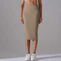High-waisted, barely-there feel, figure-hugging bodycon skirt. casual, sporty midi skirt with high elasticity and skin-friendly fabric. features a slit and is perfect for yoga or everyday wear