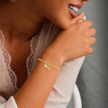 Amazon's new round snake bone fashion 18k gold plated couple friendship letter bracelet factory