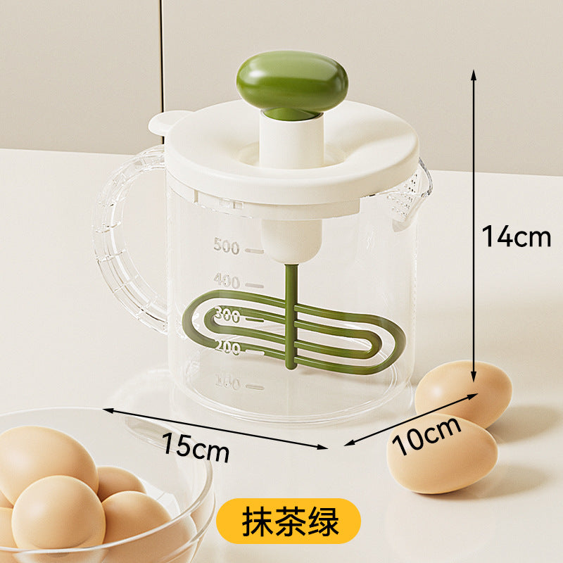 Multifunctional hand mixer with built-in whisk, press-down filter, and egg beater – perfect for cream whipping and baking