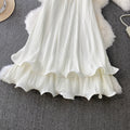 Beach vacation style sexy backless halter sundress - women's summer loose fit flattering tiered cake dress
