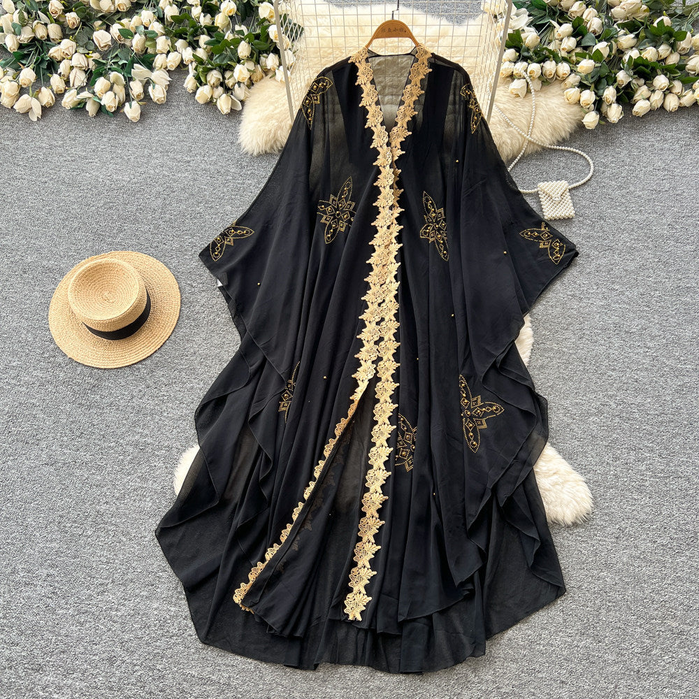 French-style, heavily embellished beaded v-neck hooded dress for women, perfect for spring. features a wine-red, asymmetrical hemline, exuding a sophisticated and elegant vibe