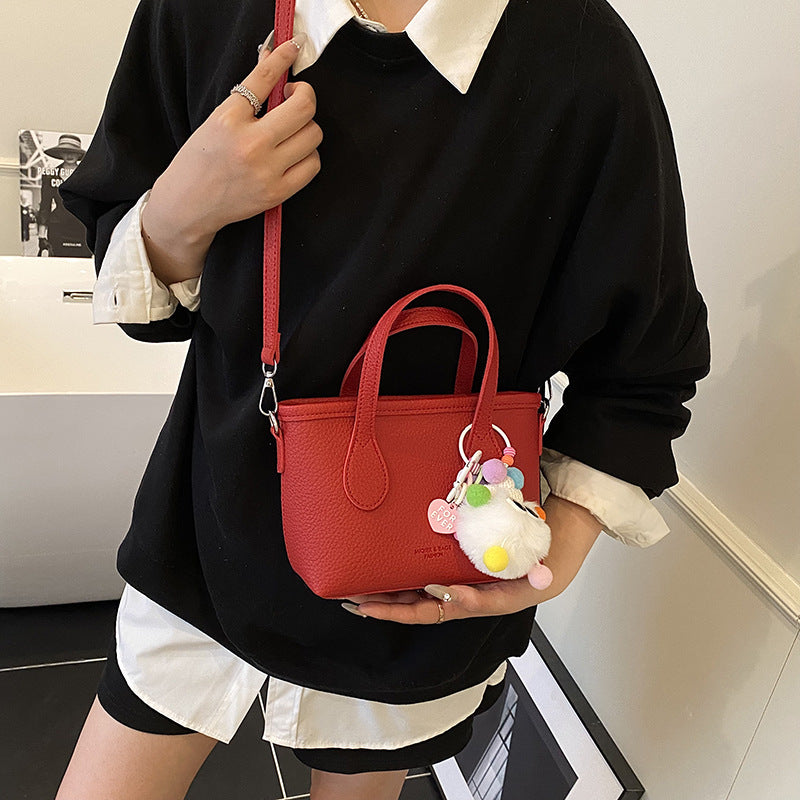 Foreign-style high-end sense portable bucket bag women's 2025 new casual simple messenger bag commuter shoulder bag