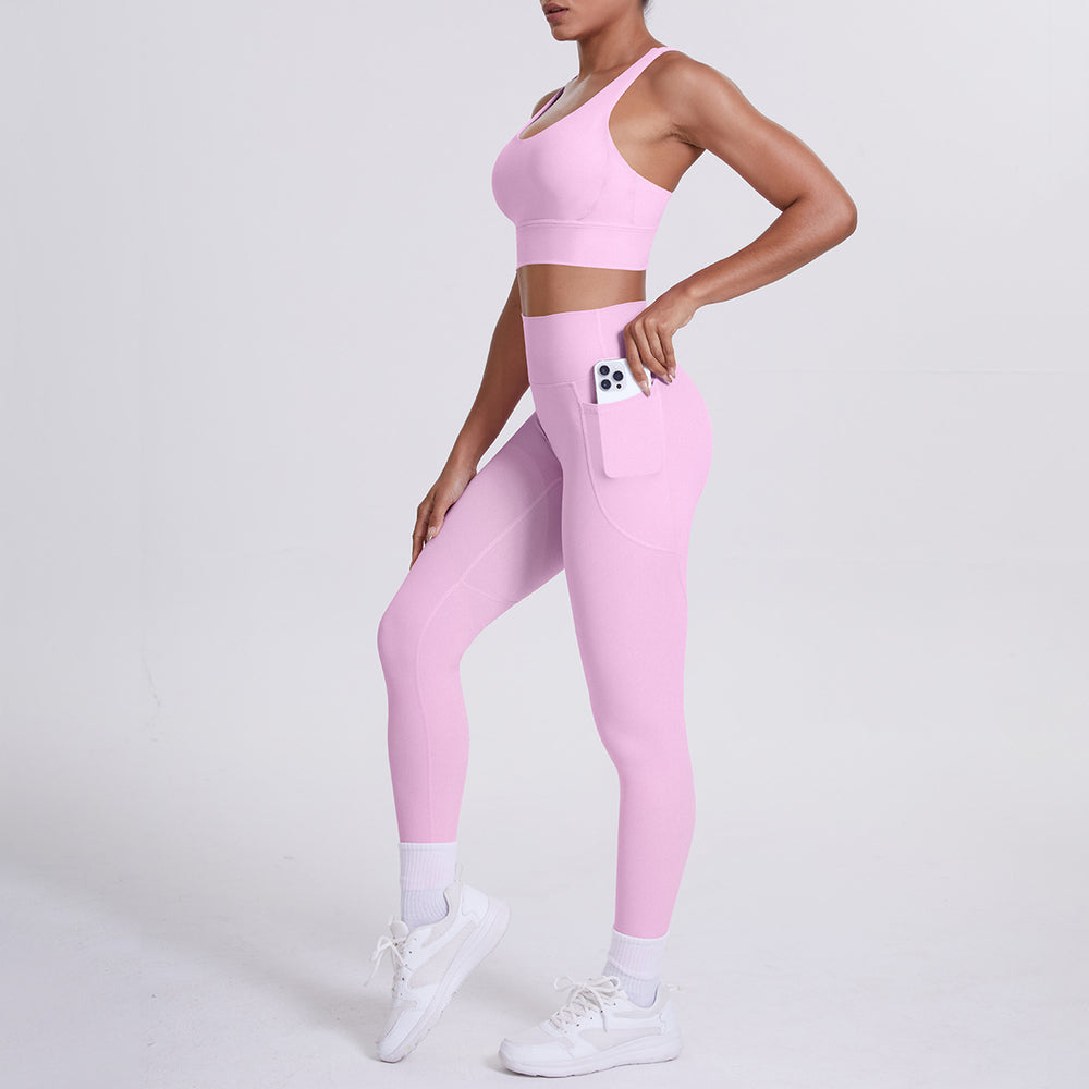 New arrival cross beautiful back cloud sense tight yoga suit suit women's high waist hip pocket sports fitness suit two-piece set