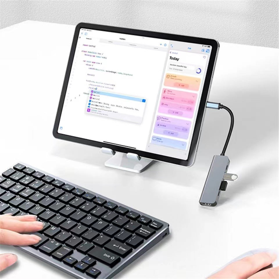 Universal 5-in-1 docking station - multi-functional hub for phones, laptops, and gaming consoles