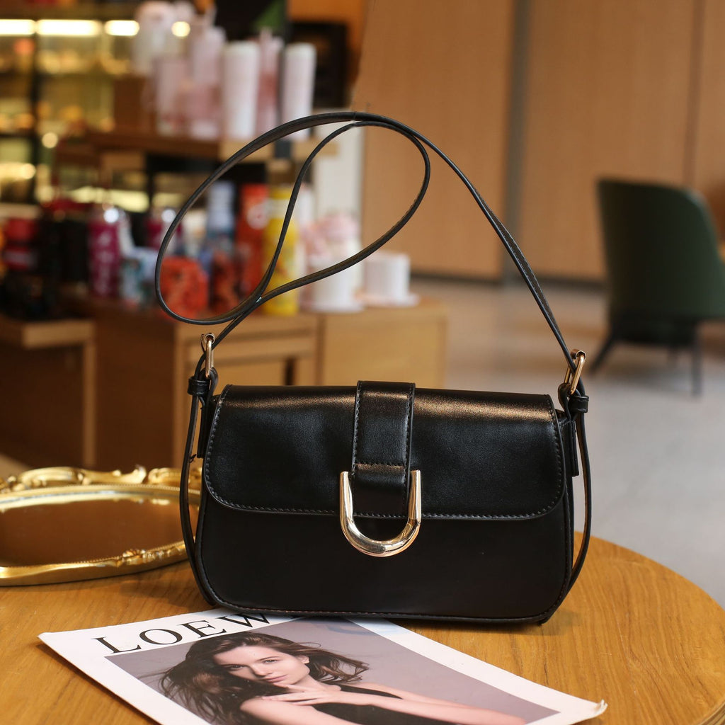 European and American business elite baguette bag 2025 summer high sense Internet celebrities with the same crossbody armpit bag PU leather shoulder bag