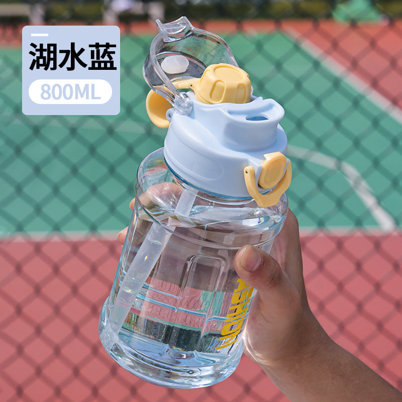 Summer large capacity outdoor sports water bottle for men and women, portable drop-proof plastic water bottle with bouncing straw space cup