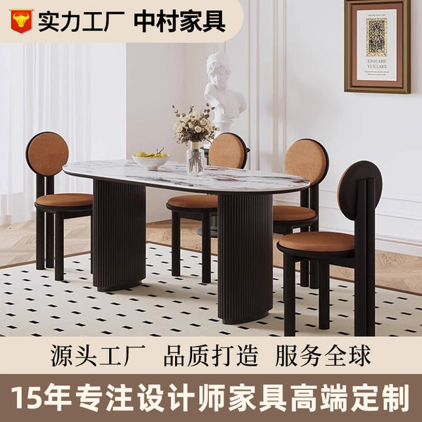French medieval dining table and chair combination simple rock slab oval dining table household solid wood dining table black