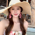Super fairy and beautiful seaside resort style red flower tassel earrings for women, accessible luxury, high-end earrings, huge beautiful earrings