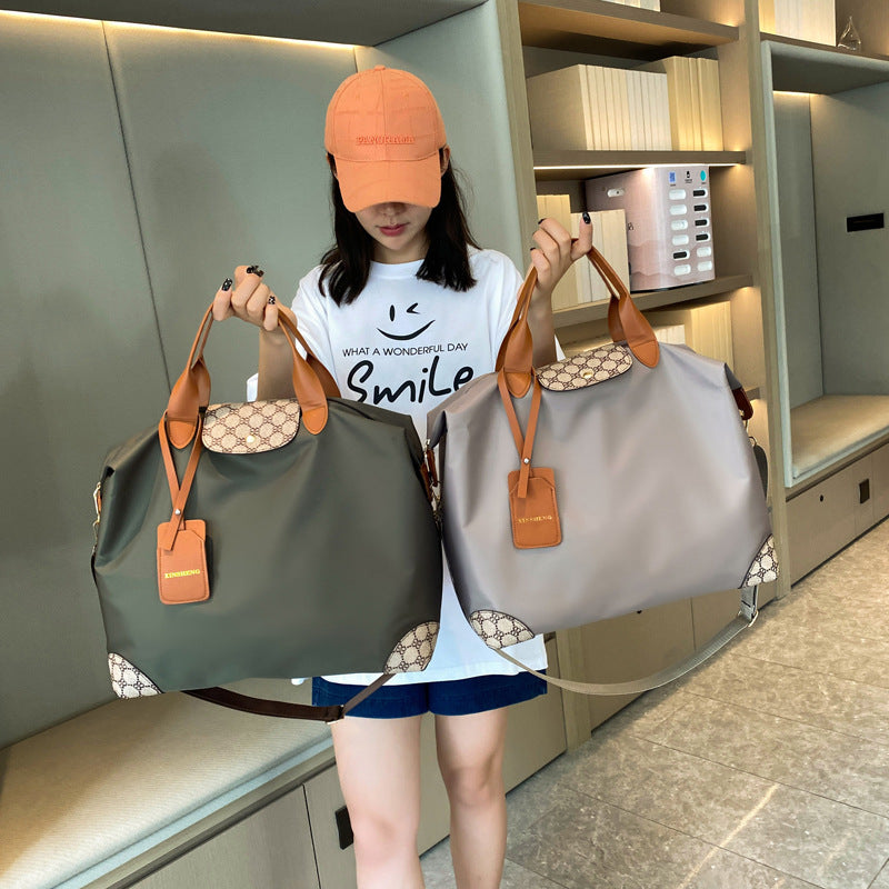 New short-distance travel bag going out to travel fashionable leisure simple business trip portable bag boarding handbag women