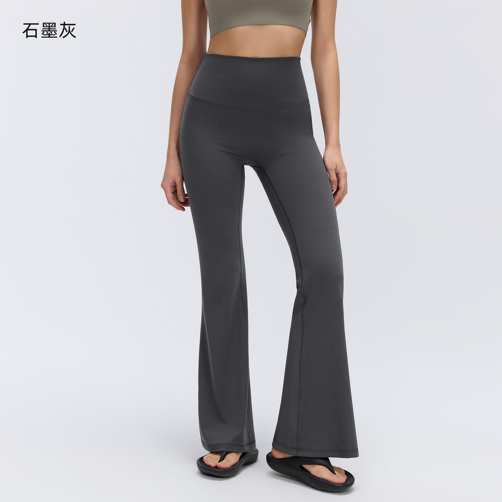 High-waisted, slightly flared yoga pants for women, designed to lift the hips, flatten the tummy, and create a slimming silhouette. these stretchy, barely-there feel leggings are perfect for pilates and other fitness activities. style d26017