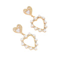 European and american cross-border casual sweet heart pearl earrings - light luxury, high-end, elegant, versatile, hollow heart stud earrings for women