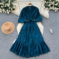 French-inspired v-neck floral chiffon dress with flared sleeves, tie waist, and a figure-flattering, vintage-inspired silhouette