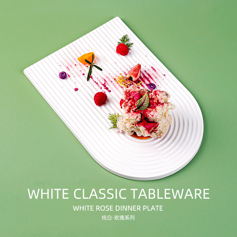 European minimalist pure white ceramic striped dessert and pastry platter, suitable for restaurants, hotels, and home use. unique ceramic long plate