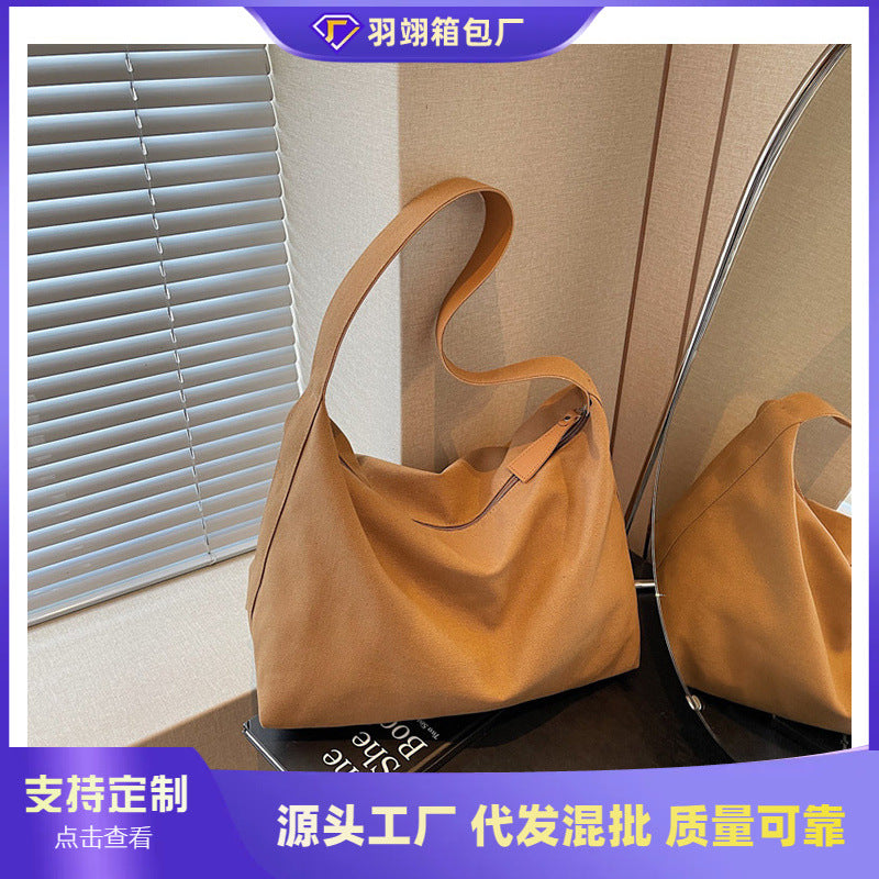 Cross-border canvas bag women's large-capacity 2025 new summer versatile simple shoulder bag casual college student tote bag