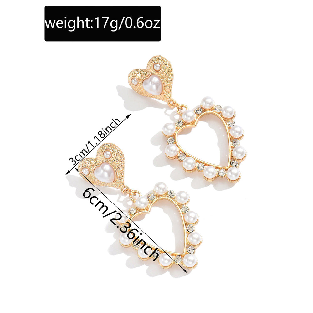 European and american cross-border casual sweet heart pearl earrings - light luxury, high-end, elegant, versatile, hollow heart stud earrings for women