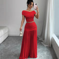 European and american cross-border women's fashion:  summer new arrival - solid color off-the-shoulder top with cinched waist pleated panel skirt two-piece set