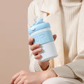 Portable, stylish water bottle - trendy glass straw cup with cute cartoon design, perfect as a souvenir or gift, includes lid