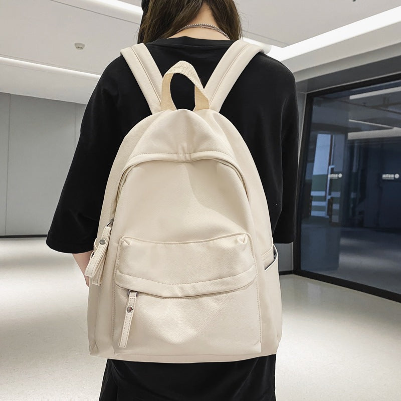 Student backpack upgraded PU Korean version fashion trendy large-capacity anti-splashing water junior high school student casual backpack