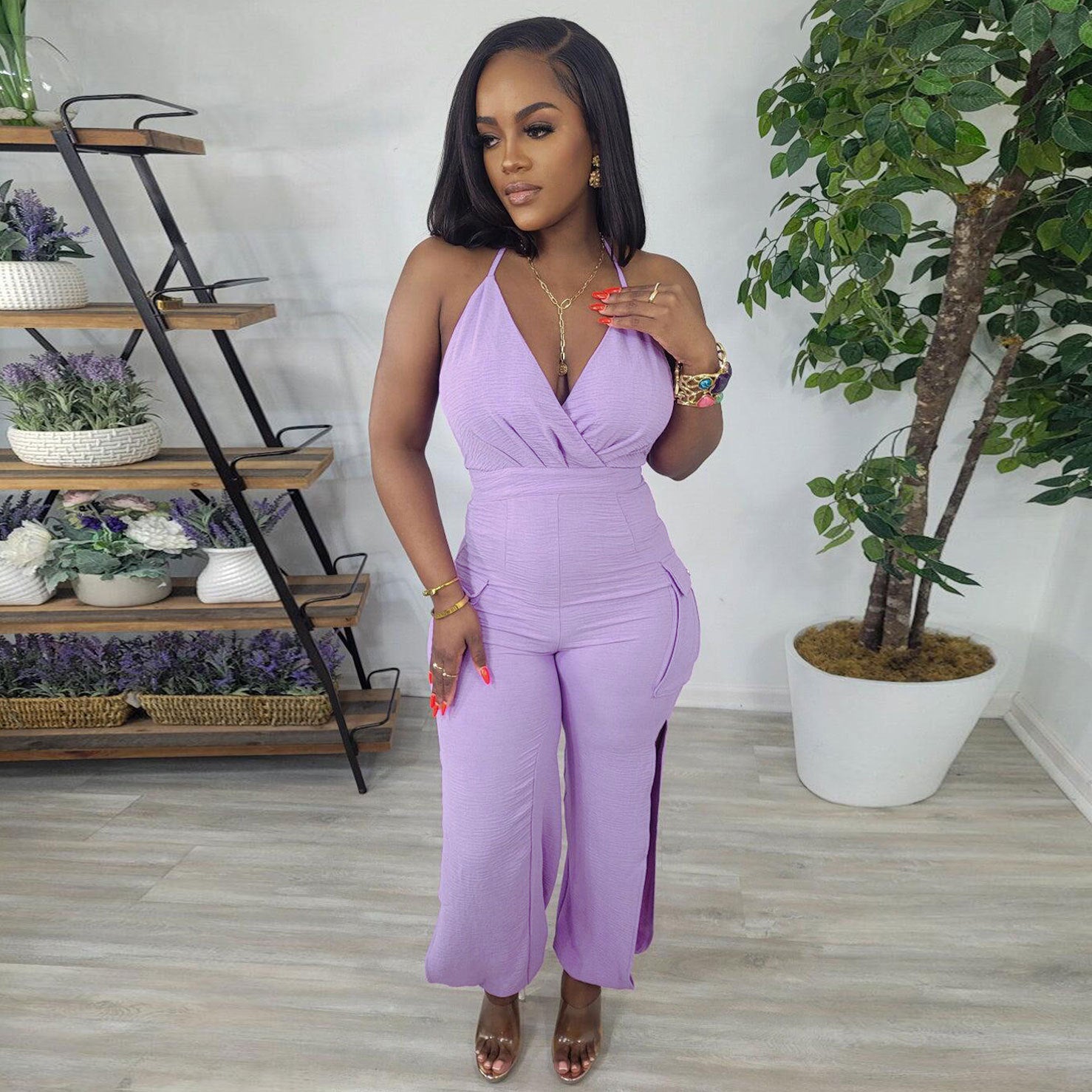 S10542 hot sale, European and American, sexy, solid color suspender neck hollow pants tight hip jumpsuit