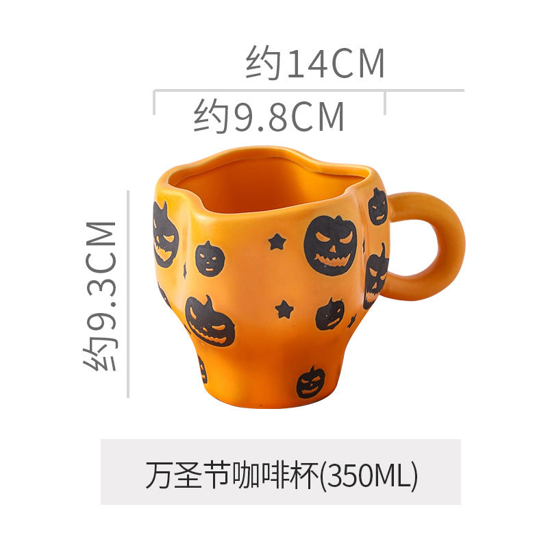 Creative halloween-themed ceramic cup and saucer set, featuring an irregular design with pumpkin and bat motifs. perfect for coffee or tea