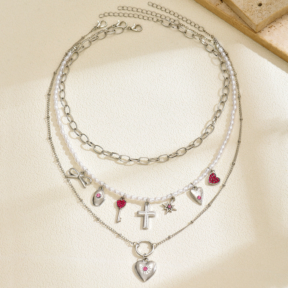 Wholesale faux pearl bowknot heart necklace - european & american cross-border fashion, sweet & cool, spicy girl style, cross pendant accessories