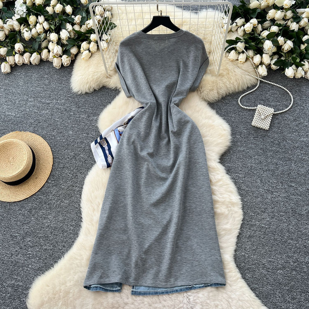 French-inspired, niche design, patchwork, tie-waist, short-sleeve denim dress for women. slimming, elegant, and features a slit midi length