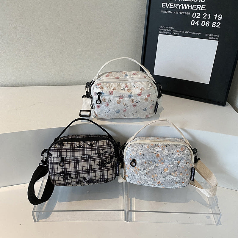 Foreign trade new floral portable women's bag large-capacity out cosmetics storage bag fashion plaid shoulder messenger bag