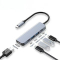 Universal 5-in-1 docking station - multi-functional hub for phones, laptops, and gaming consoles