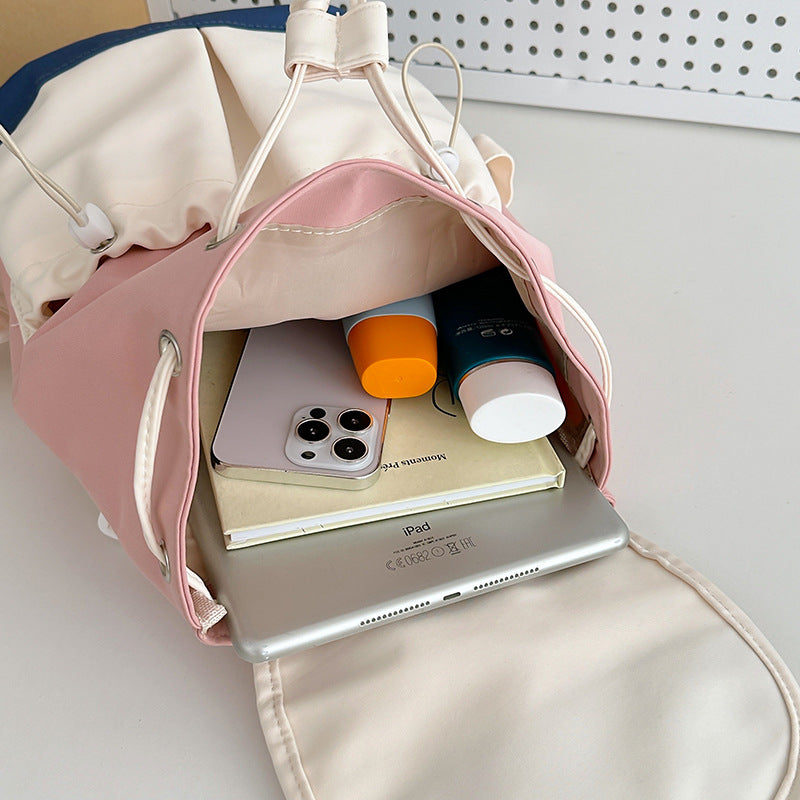 Summer new splicing contrasting color backpack 2025 bag cover design Mori niche leisure backpack going out travel bag