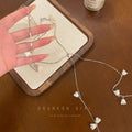 Tassel lily of the valley flower necklace light luxury classy clavicle chain butterfly gentle double layered wearing niche design necklace