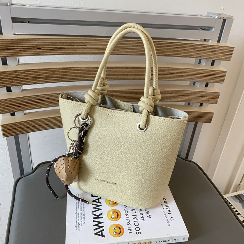 Cross-border high-end lychee pattern bucket bag women's 2025 new portable vegetable basket bag fashionable shoulder messenger bag