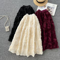 French chic floral midi skirt - high-waisted, slimming a-line design for women's spring collection