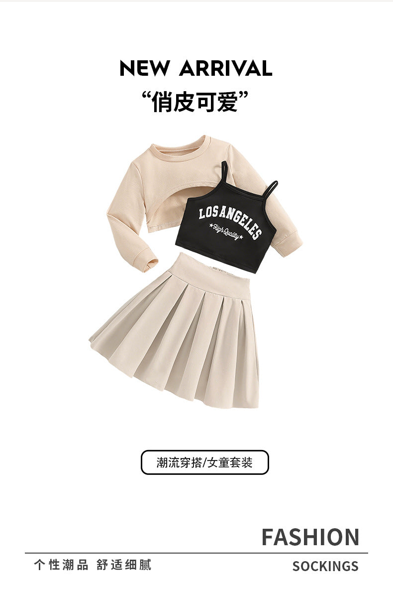 girls' three-piece set: apricot-colored cropped sweatshirt, camisole top, and high-waisted pleated mini skirt – a sporty kids' outfit