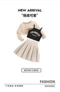 girls' three-piece set: apricot-colored cropped sweatshirt, camisole top, and high-waisted pleated mini skirt – a sporty kids' outfit