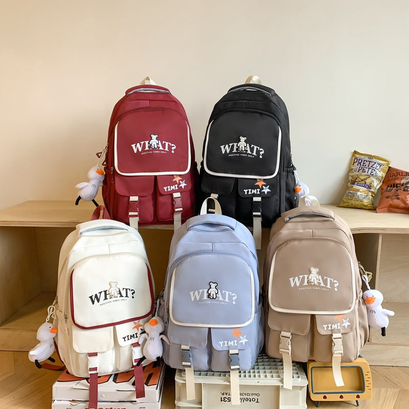 School bag for female junior high school students, large-capacity Japanese backpack for primary school students, third to ninth grades to reduce the burden and protect the spine, fashionable backpack