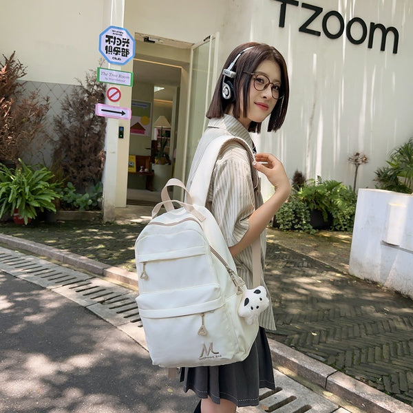 Wholesale solid color simple schoolbag niche design fashion casual versatile backpack large capacity lightweight waterproof backpack