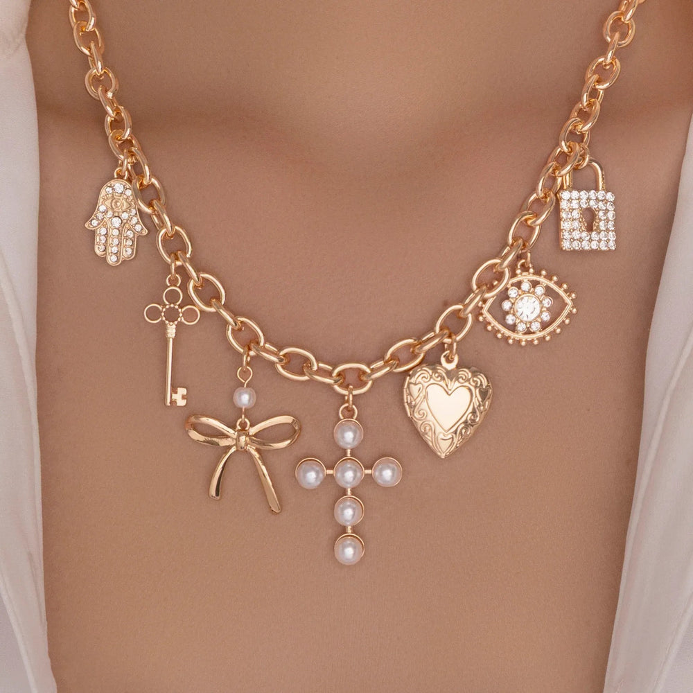 Amazon's hottest retro cross heart clavicle chain niche accessible luxury diamond-encrusted imitation pearl bow necklace for women